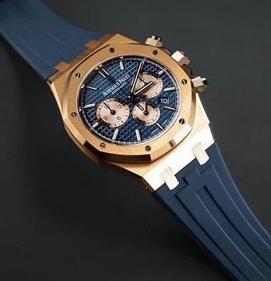 Montre de luxe sport avec boîtier doré, cadran bleu et bracelet en caoutchouc bleu, misterchrono.com