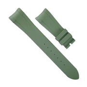 Bracelet de montre vert en caoutchouc pour montres de luxe, accessoire sur fond blanc