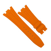 Bracelet de montre orange en caoutchouc pour montres de luxe, accessoire sur fond blanc