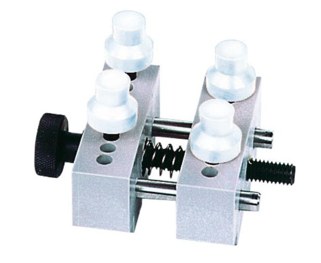 Porte-mouvements pour montres / étau universel