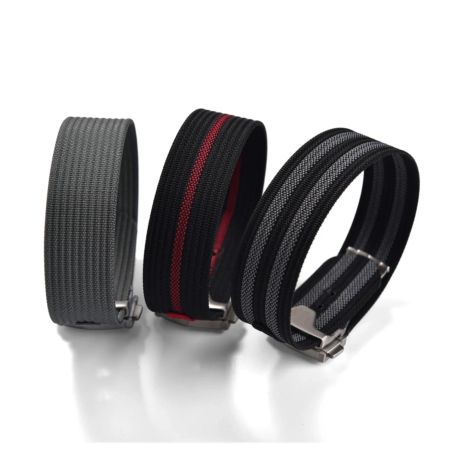 Trois bracelets de montre en tissu, gris et noir, accessoires pour montres de luxe misterchrono.com